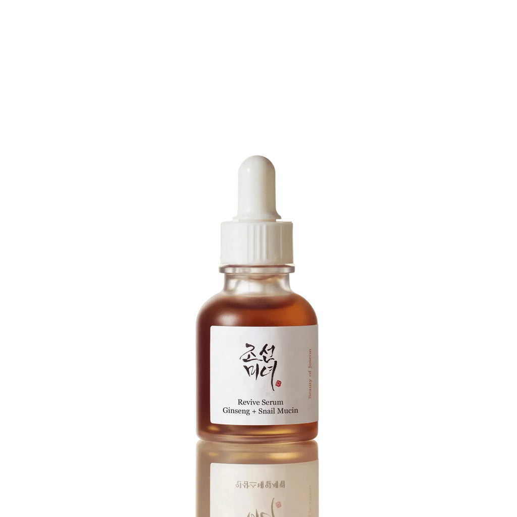Skincare serum bottle with dropper on a light beige background